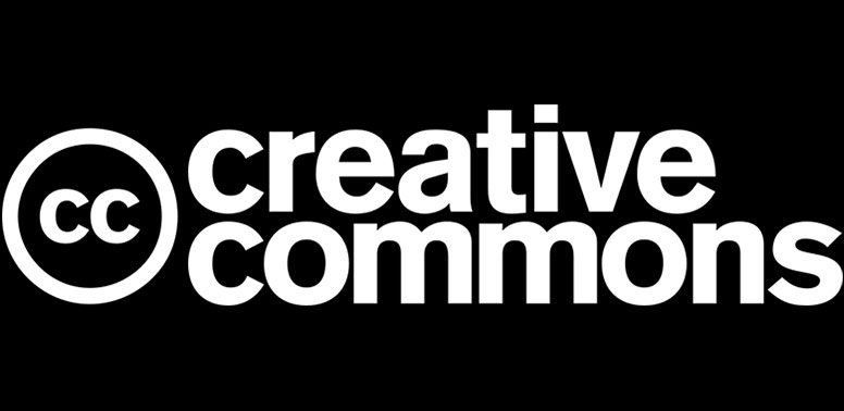 Na crnoj podlozi bijelim slovima piše creative commons, a s lijeve strane je krug u kojemu su dva slova c.