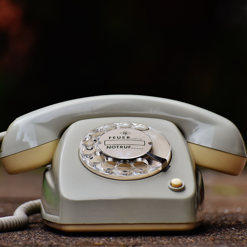 A phone with a rotary dial.