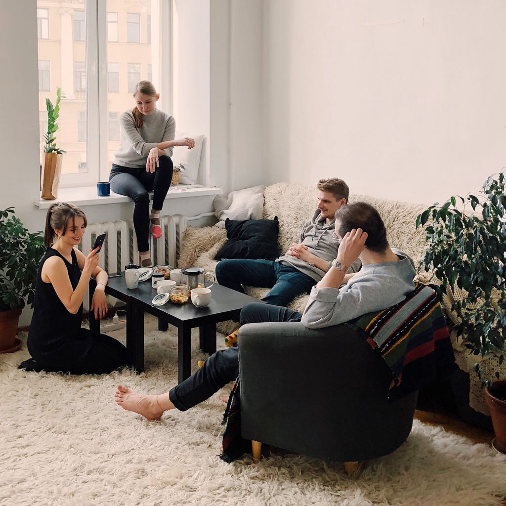 People hanging out in the living room.