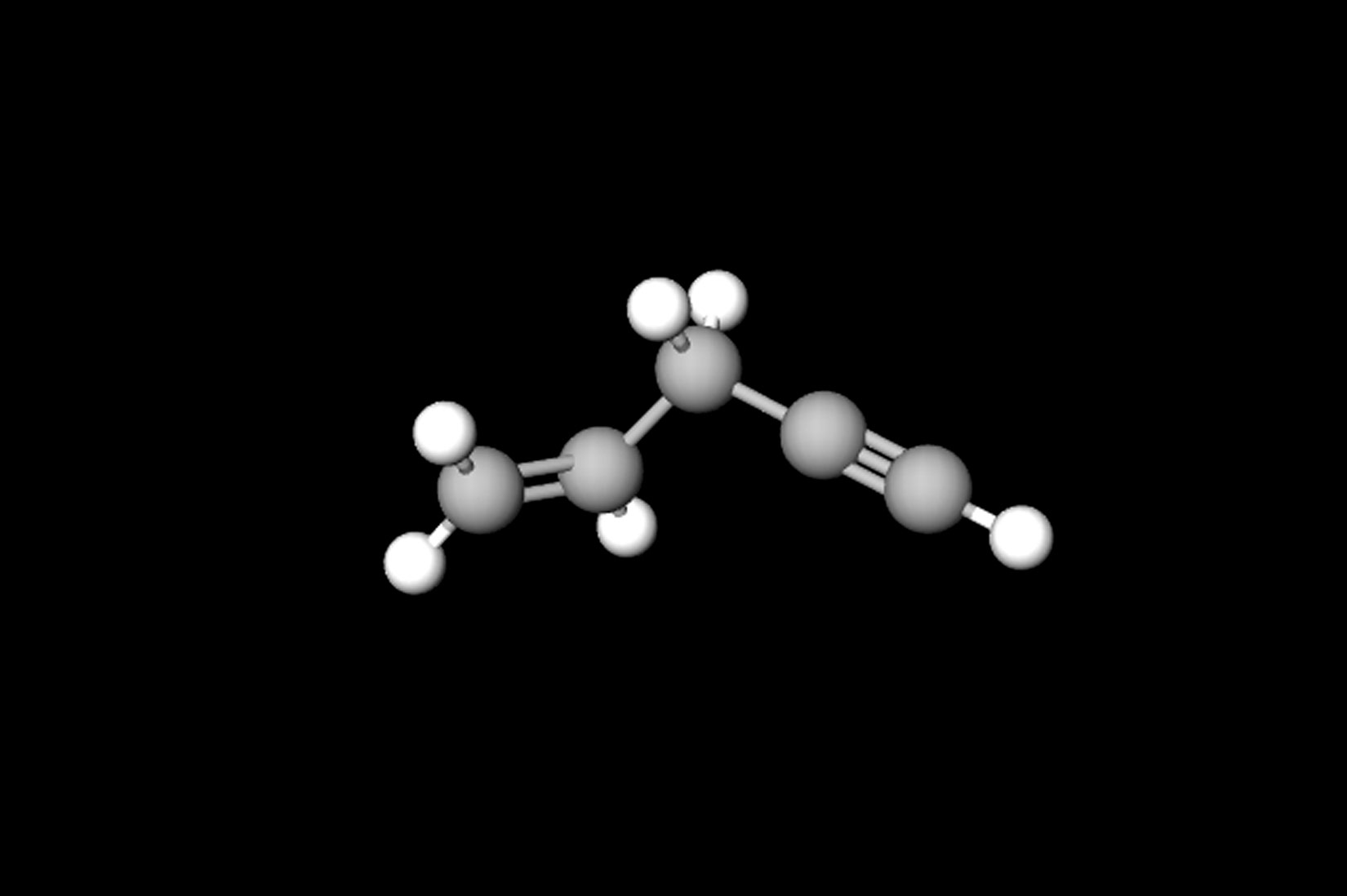 Fotografija prikazuje model spoja: pent-1-en-4-in načinjen od kuglica i štapića. Vidljivo je da su neki atomi ugljika povezani jednostrukim vezama, neki dvostrukim, a neki trostrukim.